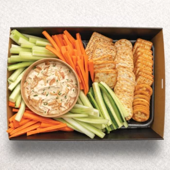 French onion dip with veggie sticks and crackers
