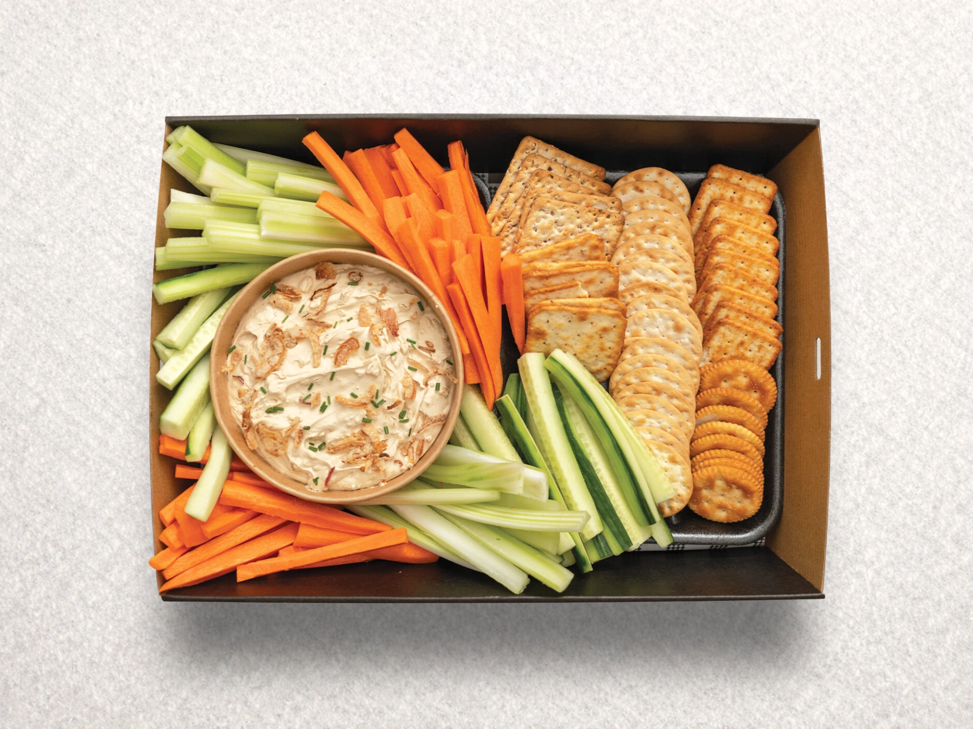 French onion dip with veggie sticks and crackers French onion dip with veggie sticks and crackers