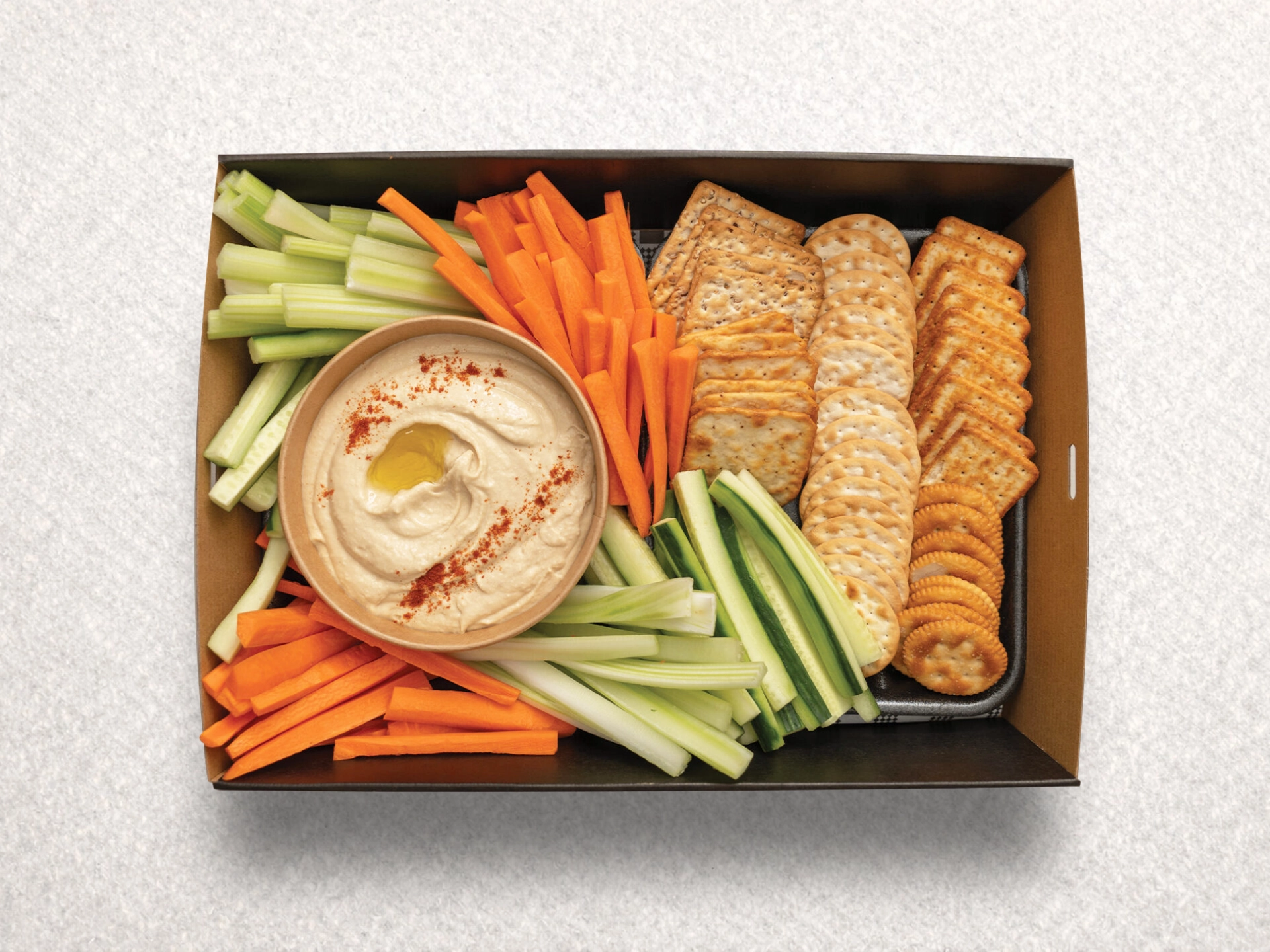 Hummus Dip With Veggie Sticks and Crackers Hummus Dip With Veggie Sticks and Crackers